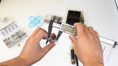 An image of the drone in hand (Image source: Hoarder Sam; screenshot)