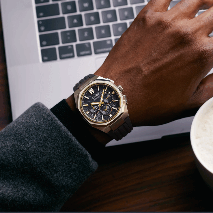 he HAB003 swaps the titanium bracelet for a rubber strap and adds gold-tone accents.