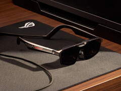 The ROG Xreal R1 come with a dock and they cost $849. Pictured: A promo picture showing the glasses on a table.