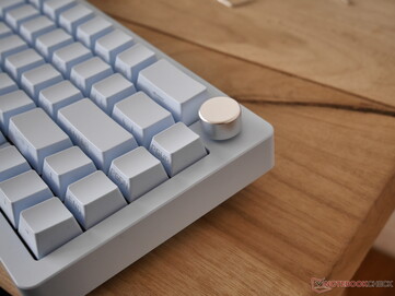 The metal volume knob is somewhat slippery, and it has a click function as well. 