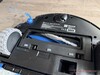 The side brush is not extendable; the main brush can be raised.
