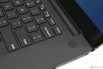 Fingerprint-enabled Power button. No white glass-fiber unlike on the XPS 13