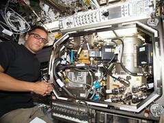 NASA astronaut Joe Acaba installing hardware to test controlling pressure in cryogenic fuel tanks (Image source: NASA; cropped)