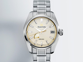 The Grand Seiko SBGA519 against a gradient background.