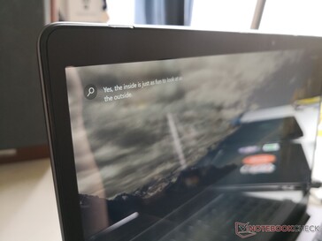 Glossy overlay with no edge-to-edge glass