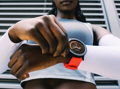 The CMF Watch 3 Pro features a striking, round design, optionally available with an orange strap. (Image source: Nothing)