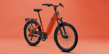 The Vida E+ EX e-bike in caramel cinnamon colorway