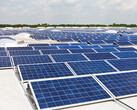 A solar panel array stacked on multiple roofs
