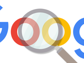 A magnifying glass hovering over the Google logo.
