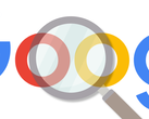 A magnifying glass hovering over the Google logo.