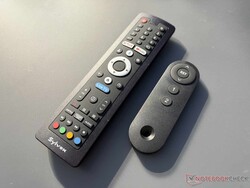 On the left, the remote control for the smart TV; on the right, the one for the TV lift in the sideboard.