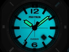 Casio Pro Trek PRJ-01AE-8 glowing turquoise in the dark, with illuminated hands and dial.