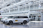 First mass-produced Xpeng GX robotaxi rolls off the production line