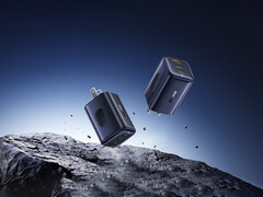 The new PicoGo 67 W AE11 costs $39.99. Pictured: A promo picture of the fast charger floating in the air over rocks. (Image source: Baseus)