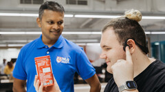 The AiSee headset describes objects to wearers with poor vision through AI image identification. (Source: AHL at NUS)