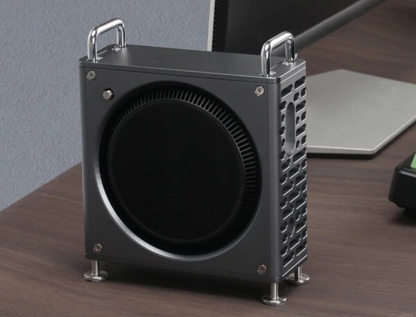 The Zeera MacForge has a metal button that presses against the Mac Mini's power button. (Image source: Zeera)
