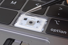 The new protective membrane added to the 3rd-gen keyboard mechanism. (Source: iFixit)