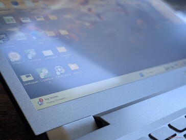 Touchscreen panel with no edge-to-edge glass