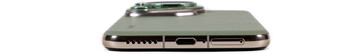 Bottom: speaker, USB, microphone, SIM