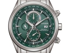 Citizen World Chronograph A.T. AT8260-85X watch with a green dial, stainless steel case and bracelet, three subdials, and a world-time scale.