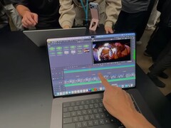 New Apple MacBook Pro 14 and 16 feature touch sensitive OLED displays.