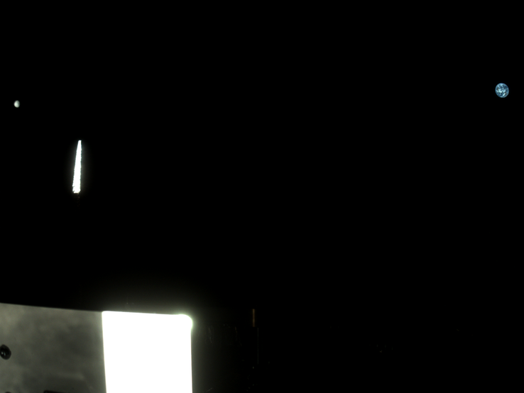 Image taken by StowCam showing Earth on the right and the Moon on the left. (Image source: NASA/Goddard/University of Arizona/Lockheed Martin)