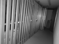 Night vision image of the cellar corridor: Details can still be seen on the wall 10 meters away.