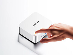 The new configuration of the mini PC features the Ryzen 7 Pro 6850H. Pictured: a promo picture of the Maco. (Image source: Aoostar - edited)