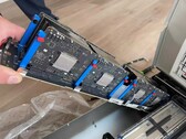 Eight Apple M5 board populated on a single carrier bar, part of a larger server blade