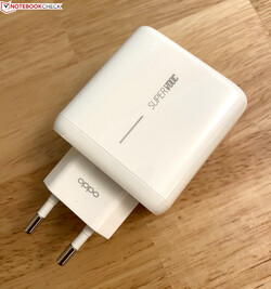 The included 65-watt power adapter