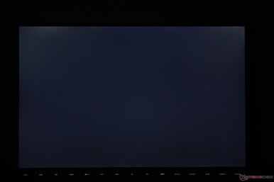 Light-moderate uneven backlight bleeding along the top corners