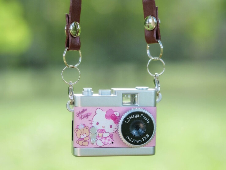 The Kenko Tokina Pieni II toy camera comes with a neck strap. (Image source: Kenko Tokina)
