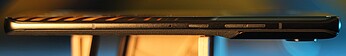 Right: microphone, standby button, volume rocker