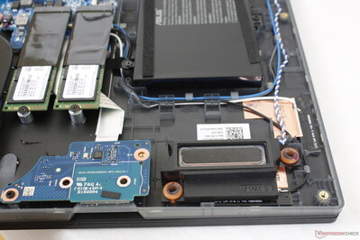 Two down-firing speakers near front corners plus two more up-firing ones along the rear Two down-firing speakers near front corners plus two more up-firing ones along the rear