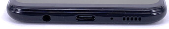 Bottom: 3.5-mm headphone jack, USB-C port, microphone hole, speaker grill