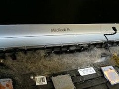 A MacBook&#039;s internals can accumulate dust in some areas. (Source: MacMedics)