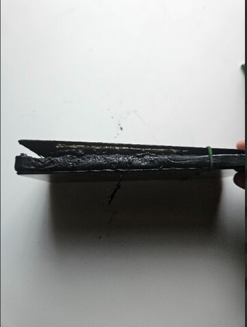 A side shot of the exploded Xiaomi Redmi Note 13 Pro 5G (Image source: Sri Varshan; screenshot)