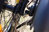 Two magnets hold the wheels together when the bike is folded