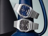 Casio AQ-240E-1A and AQ-240E-2A2 retro analog-digital watches with black and blue sunburst dials, respectively, shown side by side.