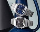Casio AQ-240E-1A and AQ-240E-2A2 retro analog-digital watches with black and blue sunburst dials, respectively, shown side by side.
