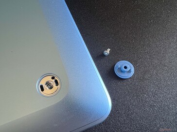 The base is secured by screws.