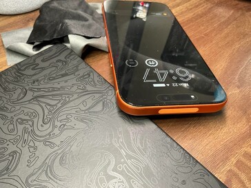 The top edge of iPhone 17 Pro Max was scuffed while in Apple's TechWoven case. (Image source: u/Jman42023)