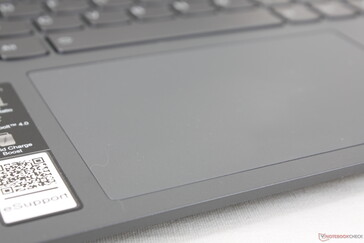 Matte gray clickpad surface is susceptible to unsightly glossy grease over time