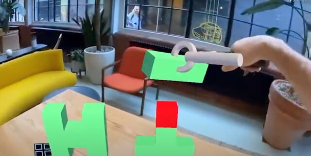 Zapbox bluetooth controllers allow you to create and manipulate in 3D mixed-reality. (Source: Zappar at YouTube)