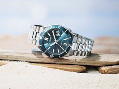 Pictured - the Citizen Tsuyosa NJ0231-56L on its side against a white background.