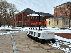 Avride delivery robot on campus (Image source: Avride)