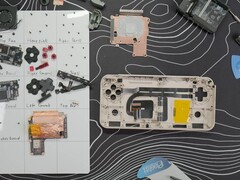 Ayaneo Pocket Ace teardown with parts laid out. (Image source:  What Obi Plays on YouTube)