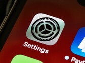 Close-up of the Settings app icon on an iPhone screen