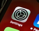 Close-up of the Settings app icon on an iPhone screen