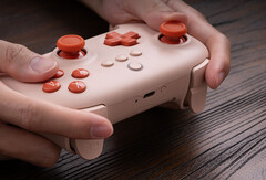 The orange 8BitDo Ultimate C Bluetooth controller for the Nintendo Switch is currently one of the cheapest controllers available for the console. (Image source: 8BitDo)